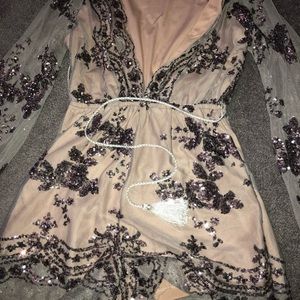 Purple sequin romper with tassel belt